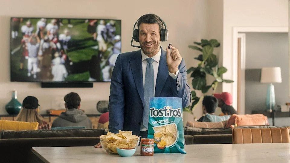 Tony Romo presenting the ear piece in the offical commercial.